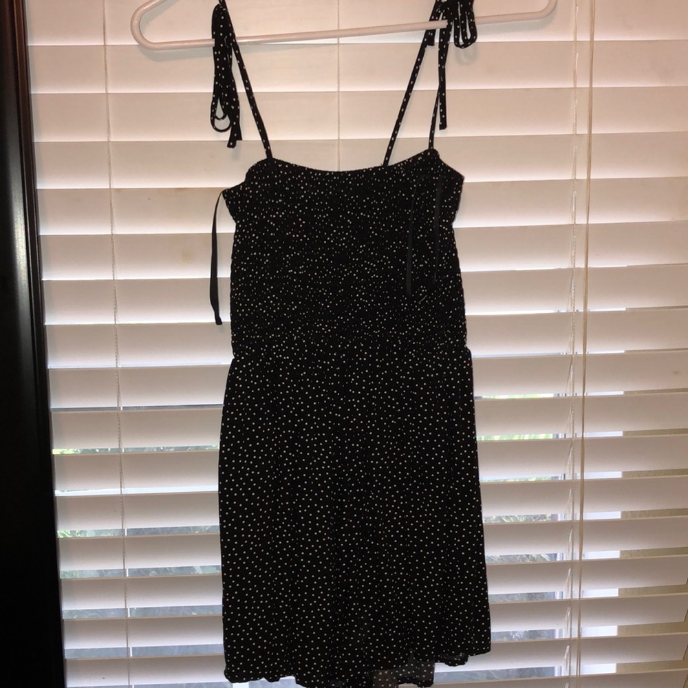 Black and white polka dot romper